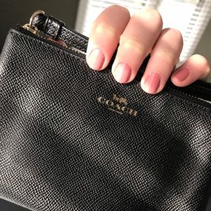 NOWT Black Coach wristlet with gold hardware
